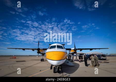 Members of the US Army Golden Knights prepare their gear before their jump at the 2022 Miramar Airshow in San Diego, California. Stock Photo