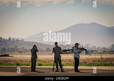 Military and civilian photographers shooting, as pilot Jon Melby prepares for takeoff, at the 2022 Miramar Airshow in San Diego, California. Stock Photo