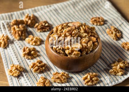 Raw Brown Organic Walnuts in a Bowl Stock Photo