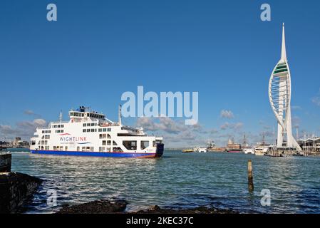 The Wightlink Isle of Wight ferry, St.Clare arriving at Portsmouth harbour with the Spinnaker Tower in the background on a sunny autumn day, Hampshire Stock Photo