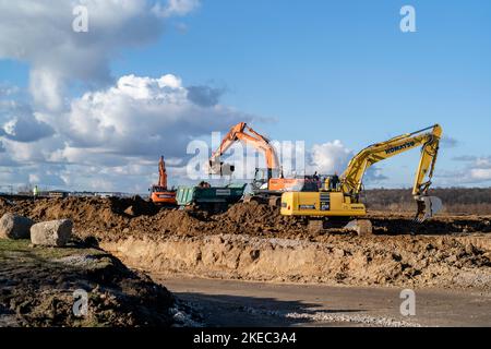 Construction site with excavator in summer Stock Photo