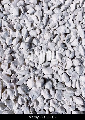Shot from above of many small white stones Stock Photo