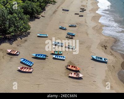 North America, Caribbean, Greater Antilles, Hispaniola Island, Dominican Republic, Sama, El Valle, Colorful wooden boats at Playa El Valle beach Stock Photo