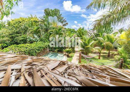 North America, Caribbean, Greater Antilles, Hispaniola Island, Dominican Republic, Sama, Las Galeras, View from the balcony into the garden in Eco Hotel Chalet Tropical Stock Photo