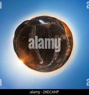 Germany, Thuringia, Goldisthal, village, road, dam, dam wall, biggest pumped storage power plant in Germany, forest, mountains, railroad high speed line in background, railroad bridges in background, overview, high voltage lines, sunrise, partly backlight, overview, aerial photo, spherical panorama Stock Photo