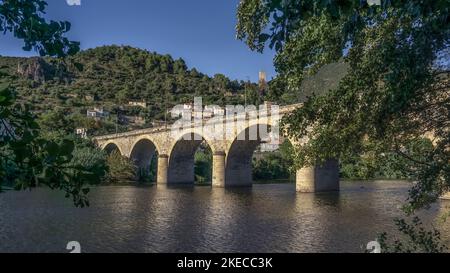 View over the river L'Orb and bridge on Roquebrun. Located in the Regional Natural Park of Haut-Languedoc. Stock Photo