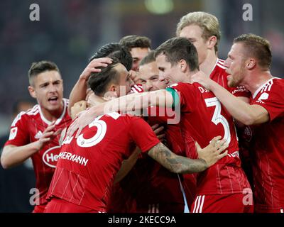 Duesseldorf, Germany. 11th Nov, 2022. Soccer: 2nd Bundesliga, Fortuna Düsseldorf - 1. FC Kaiserslautern, Matchday 17, at Merkur Spiel-Arena. The Düsseldorf goal scorer for 1:0 Michal Karbownik (2nd from left) cheers with the team. Credit: Roland Weihrauch/dpa - IMPORTANT NOTE: In accordance with the requirements of the DFL Deutsche Fußball Liga and the DFB Deutscher Fußball-Bund, it is prohibited to use or have used photographs taken in the stadium and/or of the match in the form of sequence pictures and/or video-like photo series./dpa/Alamy Live News Stock Photo