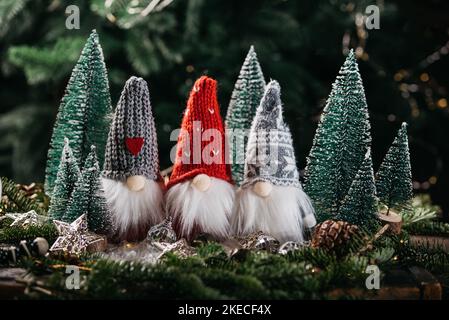 Holiday background Happy New Year 2023. Numbers of year 2023 made by gold burning candles on bokeh festive sparkling background. celebrating New Year Stock Photo