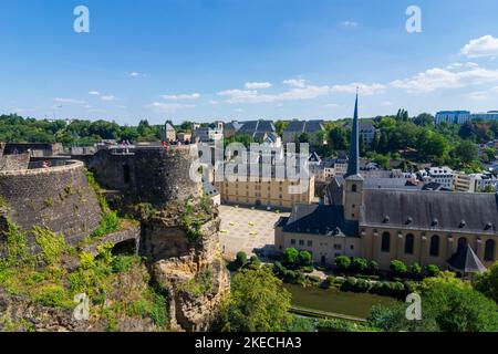 Luxembourg City (Lëtzebuerg / Luxemburg), view from the Fortress of Luxembourg to Alzette valley and Neumünster Abbey in district Grund in old town, Luxembourg Stock Photo