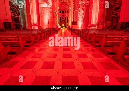 Passau, Germany. 11th Nov, 2022. The interior of St. Stephen's Cathedral is illuminated in red. In solidarity with persecuted Christians, the cathedral glows blood red. The initiator of the annual campaign is the Catholic relief organization Kirche in Not. Around Red Wednesday, this year November 23, numerous churches, monasteries, monuments and public buildings around the globe are illuminated or lit up in blood red. Credit: Armin Weigel/dpa/Alamy Live News Stock Photo