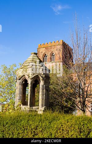 The original 1300 carved pulpit in front of The Abbey church of St Peter and St Paul,  Shrewsbury, Shropshire, England. Stock Photo