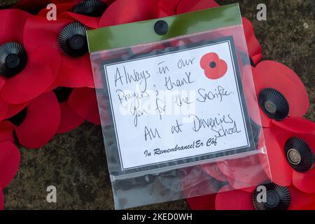 Beaconsfield, Buckinghamshire, UK. 11th November, 2022. Memorial wreaths and crosses laid at the War Memorial in Beaconsfield for Remembrance Day and Remembrance Sunday. Credit: Maureen McLean/Alamy Live News Stock Photo