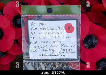 Beaconsfield, Buckinghamshire, UK. 11th November, 2022. Memorial wreaths and crosses laid at the War Memorial in Beaconsfield for Remembrance Day and Remembrance Sunday. Credit: Maureen McLean/Alamy Live News Stock Photo