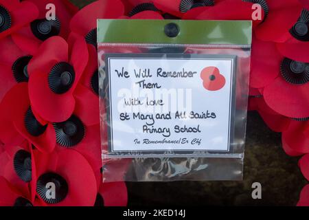 Beaconsfield, Buckinghamshire, UK. 11th November, 2022. Memorial wreaths and crosses laid at the War Memorial in Beaconsfield for Remembrance Day and Remembrance Sunday. Credit: Maureen McLean/Alamy Live News Stock Photo