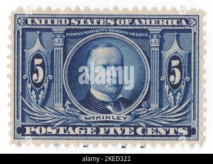 USA - 1904: An 5 cents dark blue postage stamp depicting portrait of William McKinley, Louisiana Purchase Exposition. 25th president of the United States, serving from 1897 until his assassination in 1901. As a politician he led a realignment that made his Republican Party largely dominant in the industrial states and nationwide until the 1930s. He presided over victory in the Spanish–American War of 1898; gained control of Hawaii, Puerto Rico, the Philippines and Cuba; restored prosperity after a deep depression; rejected the inflationary monetary policy of free silver Stock Photo
