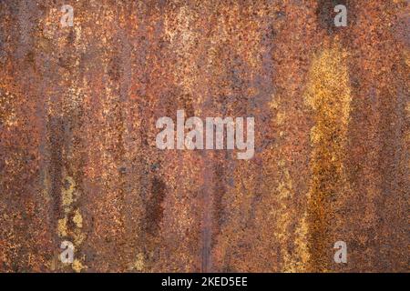 Dark light red rusty metal plate. Grunge texture. Rusty metal background. Rusty orange texture. Rust. Stock Photo
