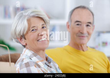happy senior couple doing diy Stock Photo
