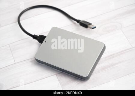 Portable External Hard Drive, with USB Connected Cable Stock Photo