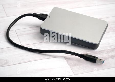 Portable External Hard Drive, with USB Connected Cable Stock Photo