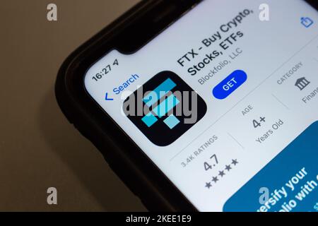 Vancouver, CANADA - Nov 11 2022 : App of FTX (FTX Cryptocurrency Exchange, FTX Trading Limited) in App Store on iPhone screen. Stock Photo