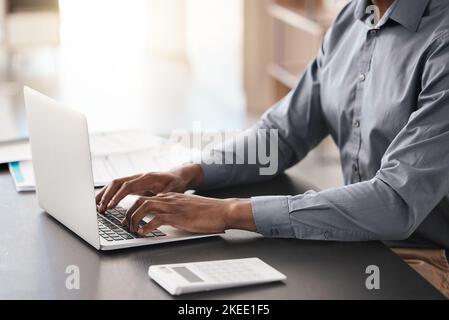 Laptop, hands typing and business man in office working on job email or report. Digital research, developer and programmer writing, programming Stock Photo