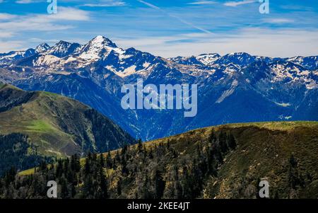 View from the Tuc de l'Etang on the Tuc de Cradere and the snow-covered peaks of the Pyrenees mountain range in the south of France (Haute Garonne) Stock Photo