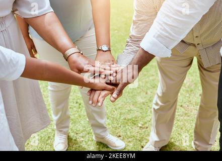 Hands, together with team and support, solidarity and trust with collaboration and community outdoor. Unity, teamwork with team building and diversity Stock Photo