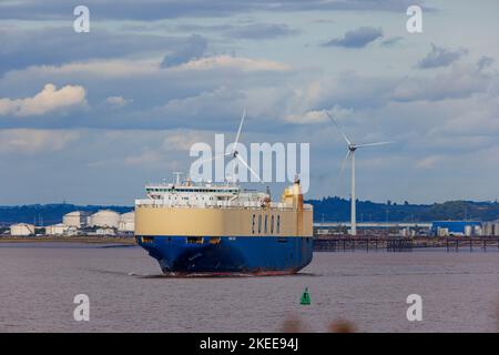 RoRo with wind turbines in the background Stock Photo