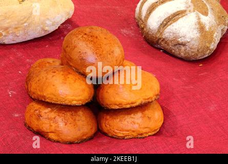 many loaves of bread made with mixed flour and seeds freshly baked by the baker Stock Photo