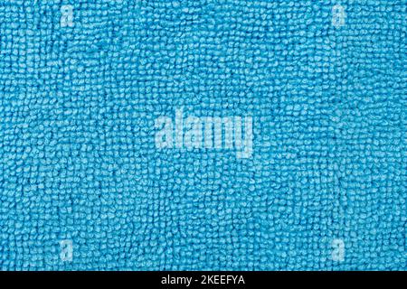 Close-up of blue microfibre or microfiber rag, cloth as texture or background Stock Photo