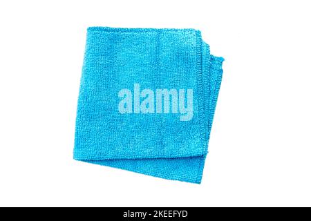 Folded blue rag for housework with soft texture isolated on white, top view Stock Photo
