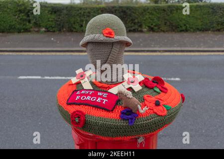 Leigh on Sea, UK. 12th Nov, 2022. A post box in Leigh has been yarn bombed with a creative crocheted scene for Remembrance Day. Penelope Barritt/Alamy Live News Stock Photo
