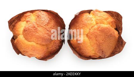 Two vanilla muffins, or cupcakes, isolated on white background Stock Photo