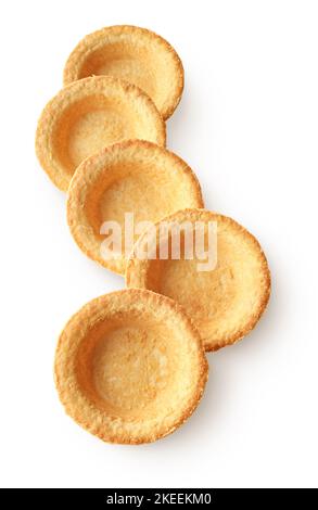 Group of empty tartlets, tart shells, isolated on white background Stock Photo