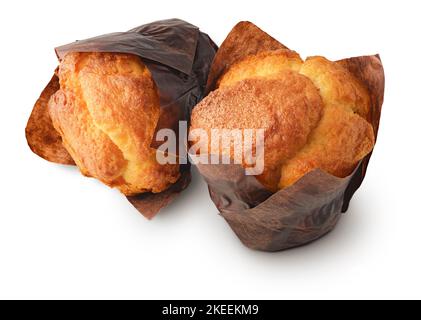 Two vanilla muffins, or cupcakes, isolated on white background Stock Photo