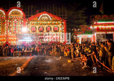 Villagers and visitors photograph the climactic burning of the effigy of the Ghost King at the decennial Da Jiu festival, Kam Tin, Hong Kong, 2015 Stock Photo