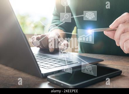 Business Intelligence. hands working with laptop computer with global network connection, data exchange, digital technology, data science and digital Stock Photo
