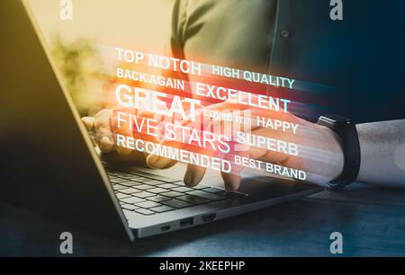 hands of man write review on product and evaluate product purchased online. rating to seller. Consumer reviews concepts. people review comments on lap Stock Photo