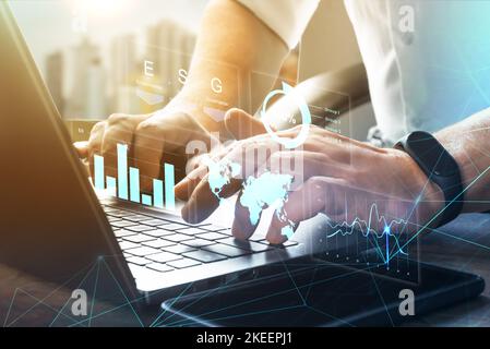 Man Typing Keyboard Laptop Hand.Project Manager Researching Process. ESG- Environmental, Social, and Corporate Governance. digital marketing, Investme Stock Photo