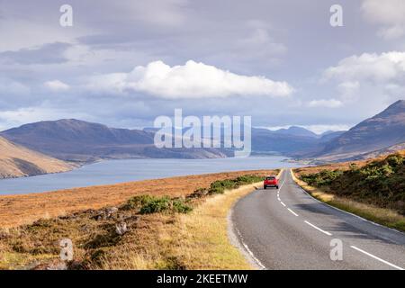 Road alongside Little Loch Broom in the highlands of Scotland Stock Photo