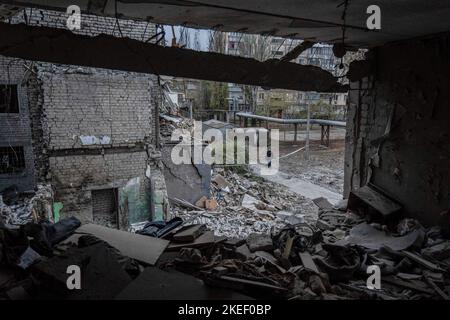 Mykolaiv, Ukraine. 11th Nov, 2022. A man was seen staring at the damaged building. A Russian missile attack on a residential building in the Inhulskyi district of Mykolaiv, a southern city in Ukraine. The deadly attack killed at least 7. Mykolaiv is a city 50 km away from Kherson city, where the Ukrainian force has gained a huge battlefield success in the past couple of days. Credit: SOPA Images Limited/Alamy Live News Stock Photo