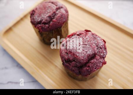 Close up of Muffins on Table Isolated on black, Stock Photo