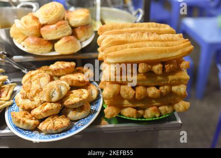 pastries with custard cream in night market of street food in Da Lat in Vietnam Stock Photo