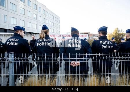 Illustration shows  a guard of honnor for the police officer injured in a stabbing attack last Thursday, as he is leaving hospital, UZ Jette, Saturday 12 November 2022. BELGA PHOTO HATIM KAGHAT Stock Photo