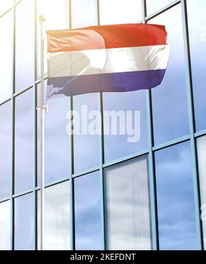 Flag of Netherlands on a flagpole Stock Photo