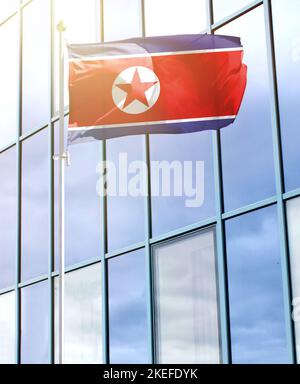 Flag of North Korea on a flagpole Stock Photo