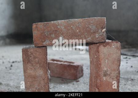 Three bricks on each other showing concept of gate Stock Photo