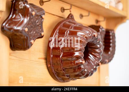 Old ceramic baking tins, kitchen utensils Stock Photo