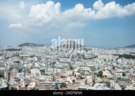 View of old wall of Acropolis, city of Athens and Mount Lycabettus (right) in Athens, Greece Stock Photo