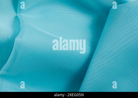 blue silk fabric. wavy fabric texture Stock Photo